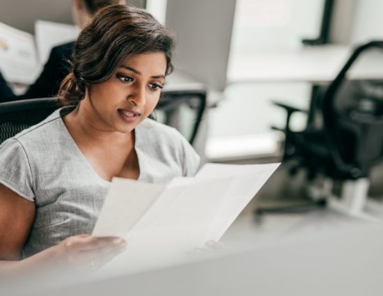 Businesswoman working at her desk