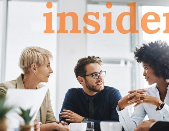 Team meeting around table with the word insider