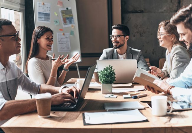 work team in a meeting in a conference room